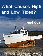 A boat in the Bay of Fundy waits for high tide.